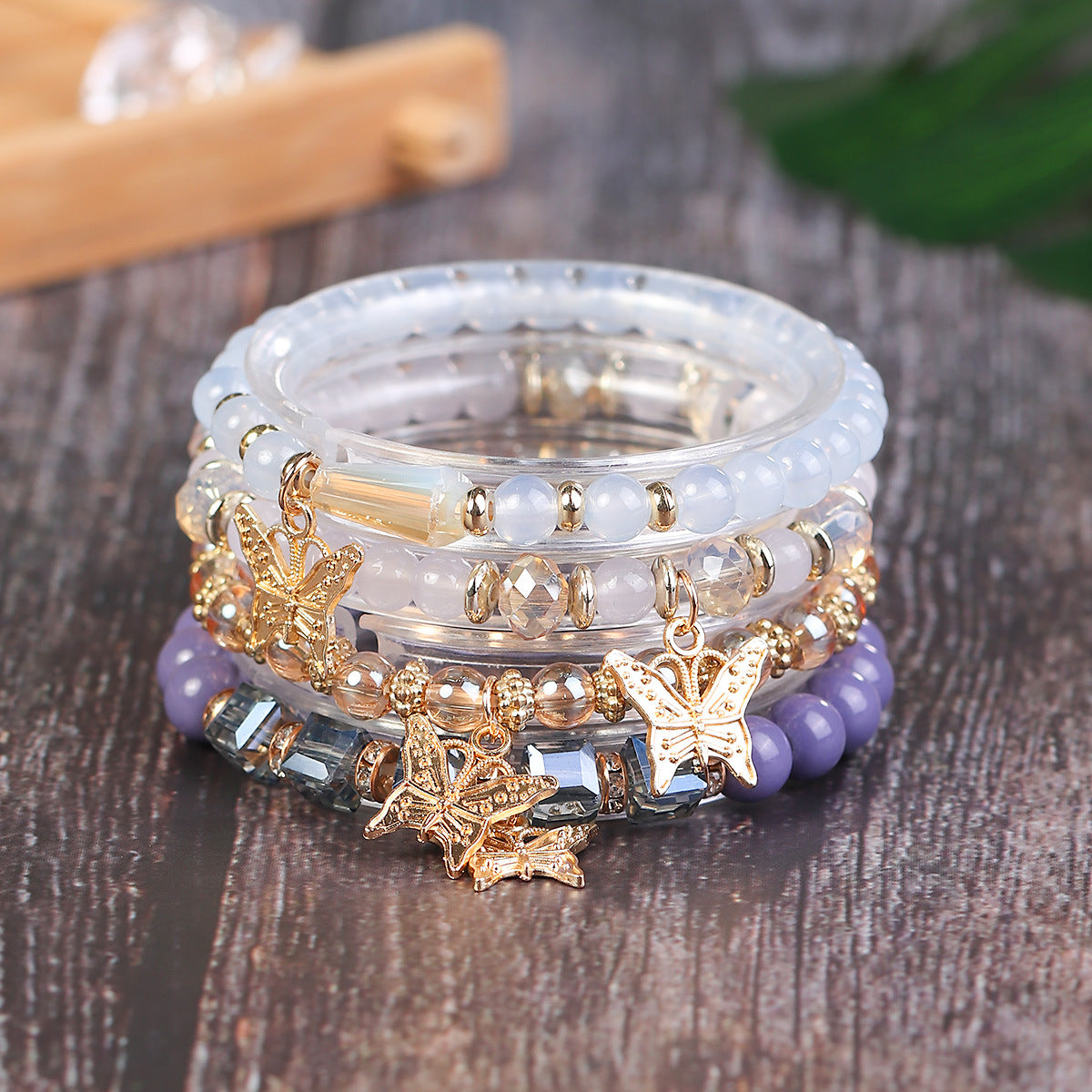 Wholesale Four Layer Butterfly Pendant Glass Elastic Bracelet